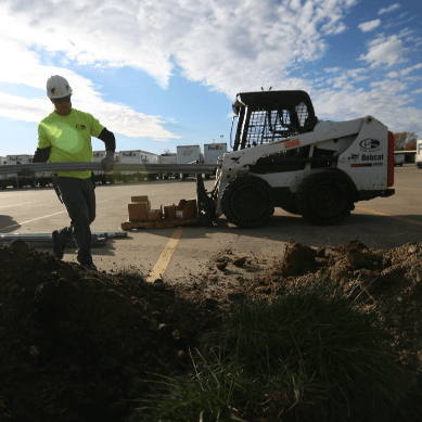 Man trying to bury electrical work