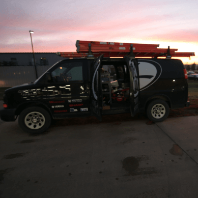 Kline black van with logo